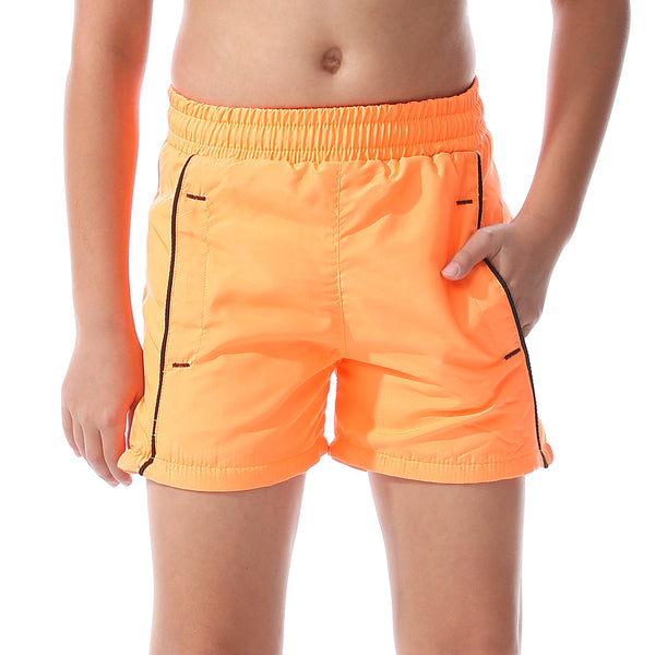 side_pockets_swimmer_short_boys_orange