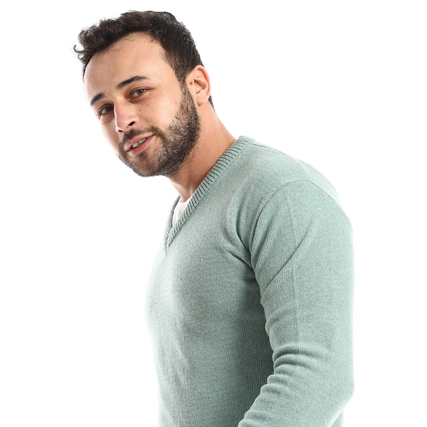 أكمام طويلة بأساور مضلعة وكنزة كول بلون أخضر نعناعي