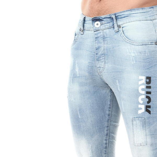 جينز ممزق مع طباعة جانبية بلون أزرق فاتح